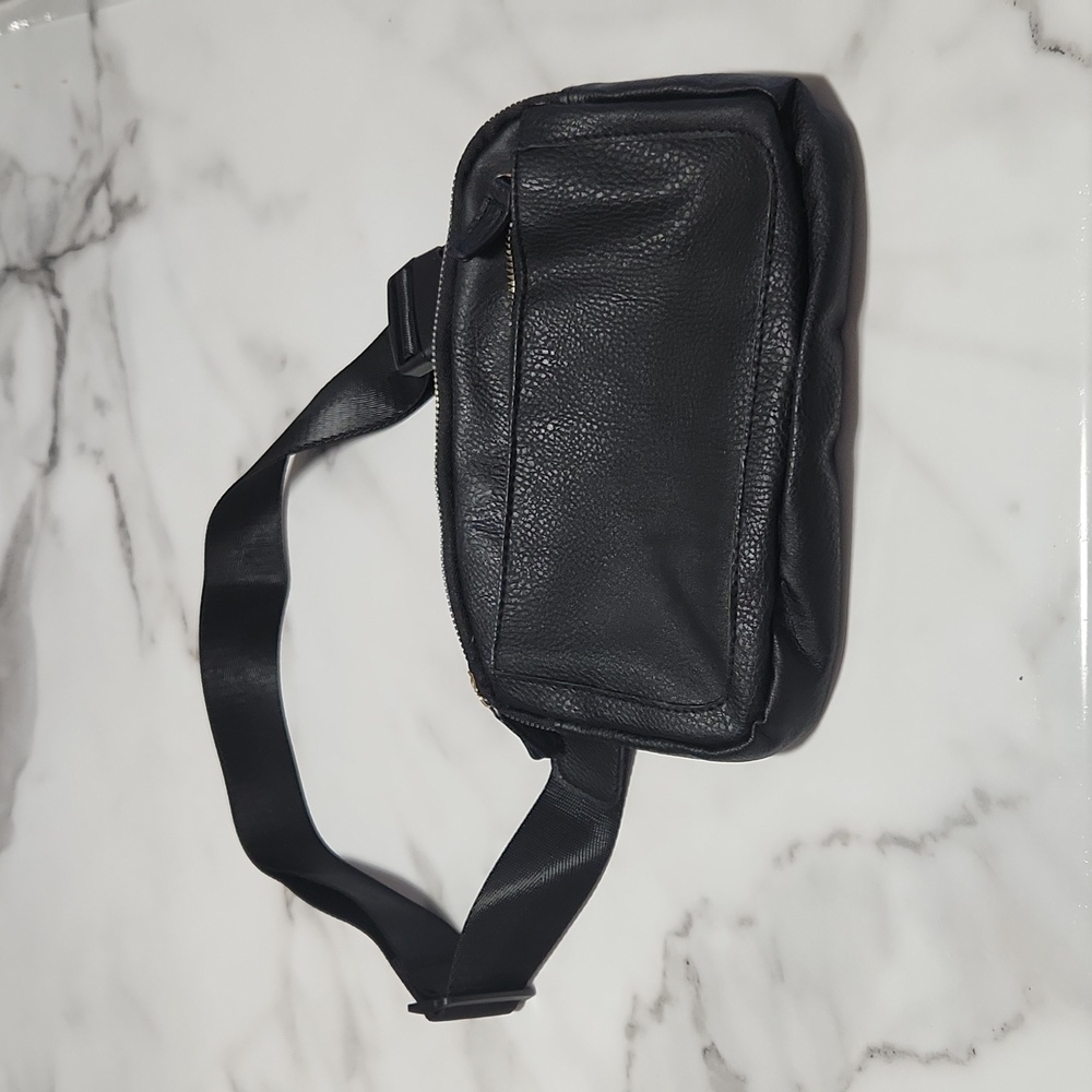 NEW! Black leather fanny pack. Super cute & comfortable w/ 3 zippers.